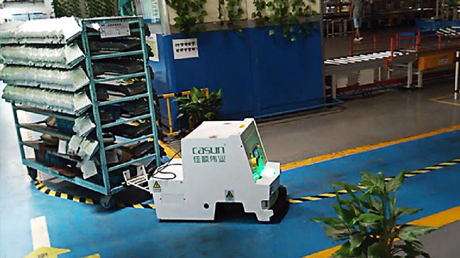 AGV τύπων ρυμούλκησης αυτόνομο καθοδηγημένο εύκαμπτο περπάτημα οχημάτων για τη βιομηχανία εγχώριων συσκευών